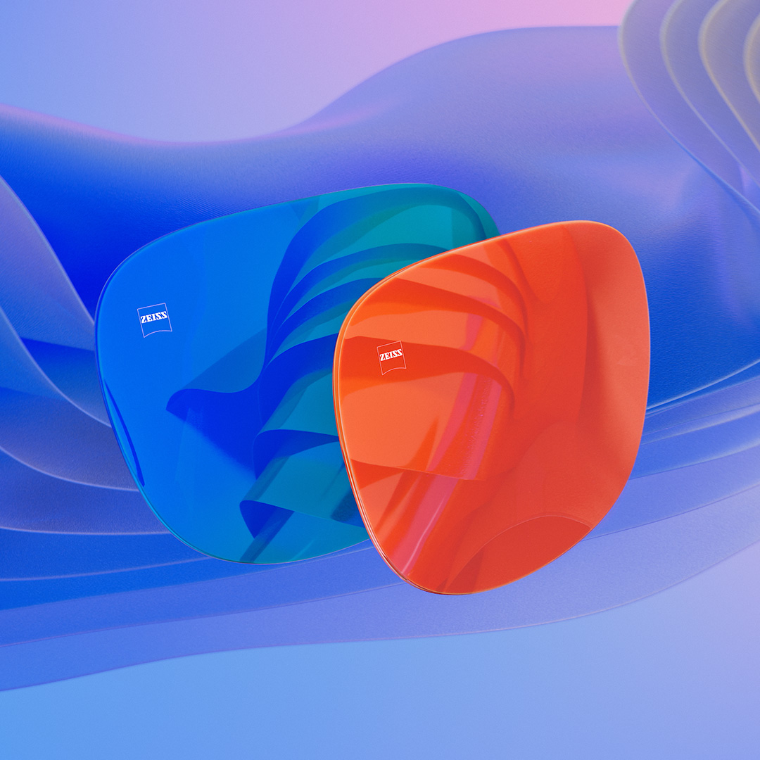 A CGI representation of sunglass lenses with colourful blue and orange mirror fronts.